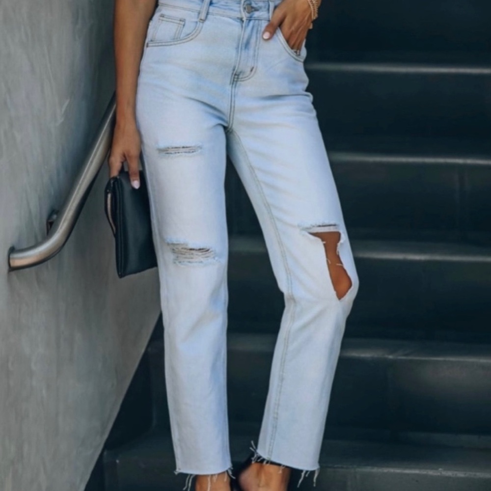 Colin distressed high rise jeans. Size 27. NWOT.